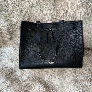 Kate Spade black tote with magnet closure and zip pocket, excellent condition